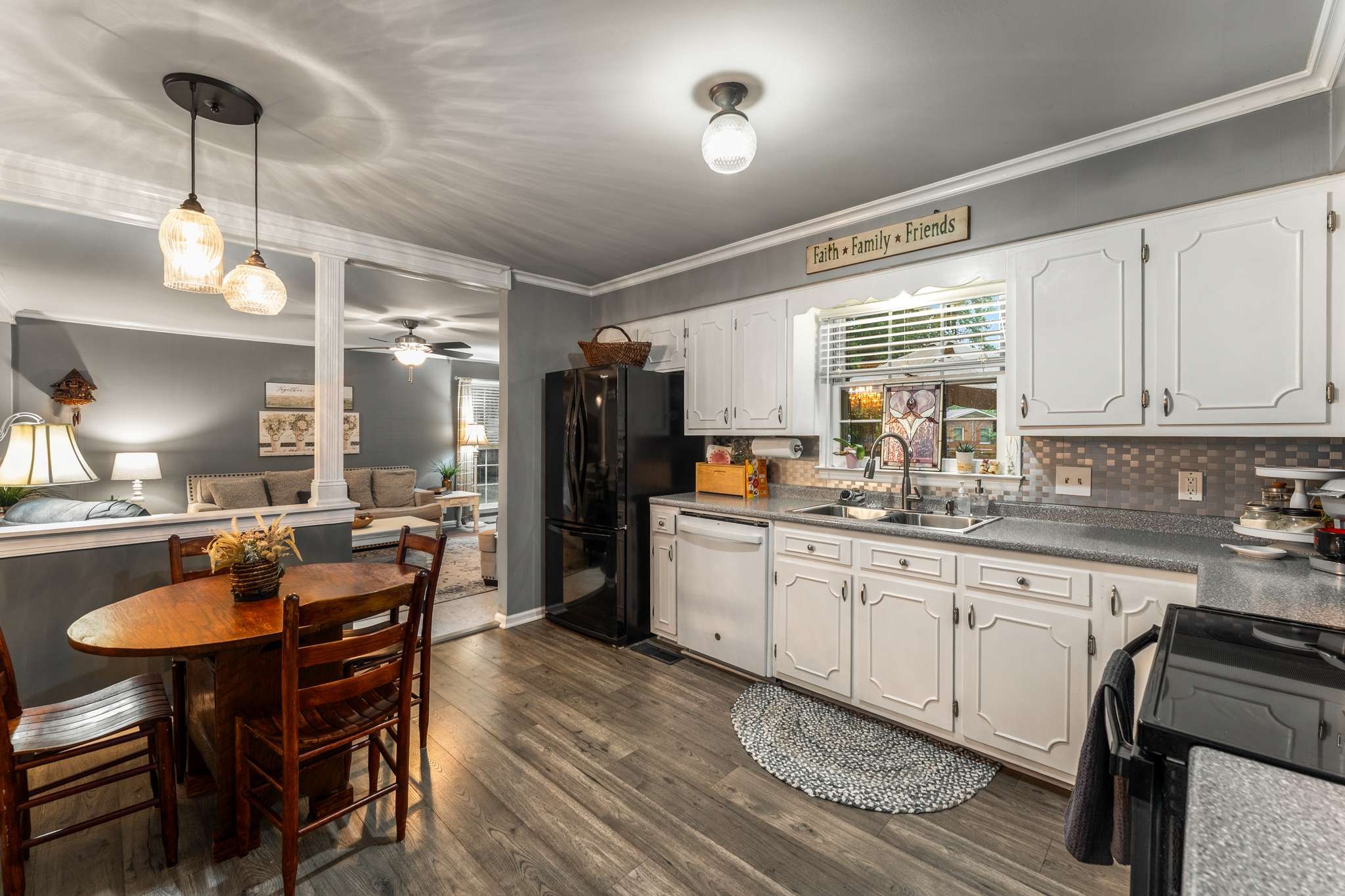 513 Rose Circle Murfreesboro, TN 37128 - Photo 15 of 37 a kitchen with granite countertop a sink appliances cabinets and dining table