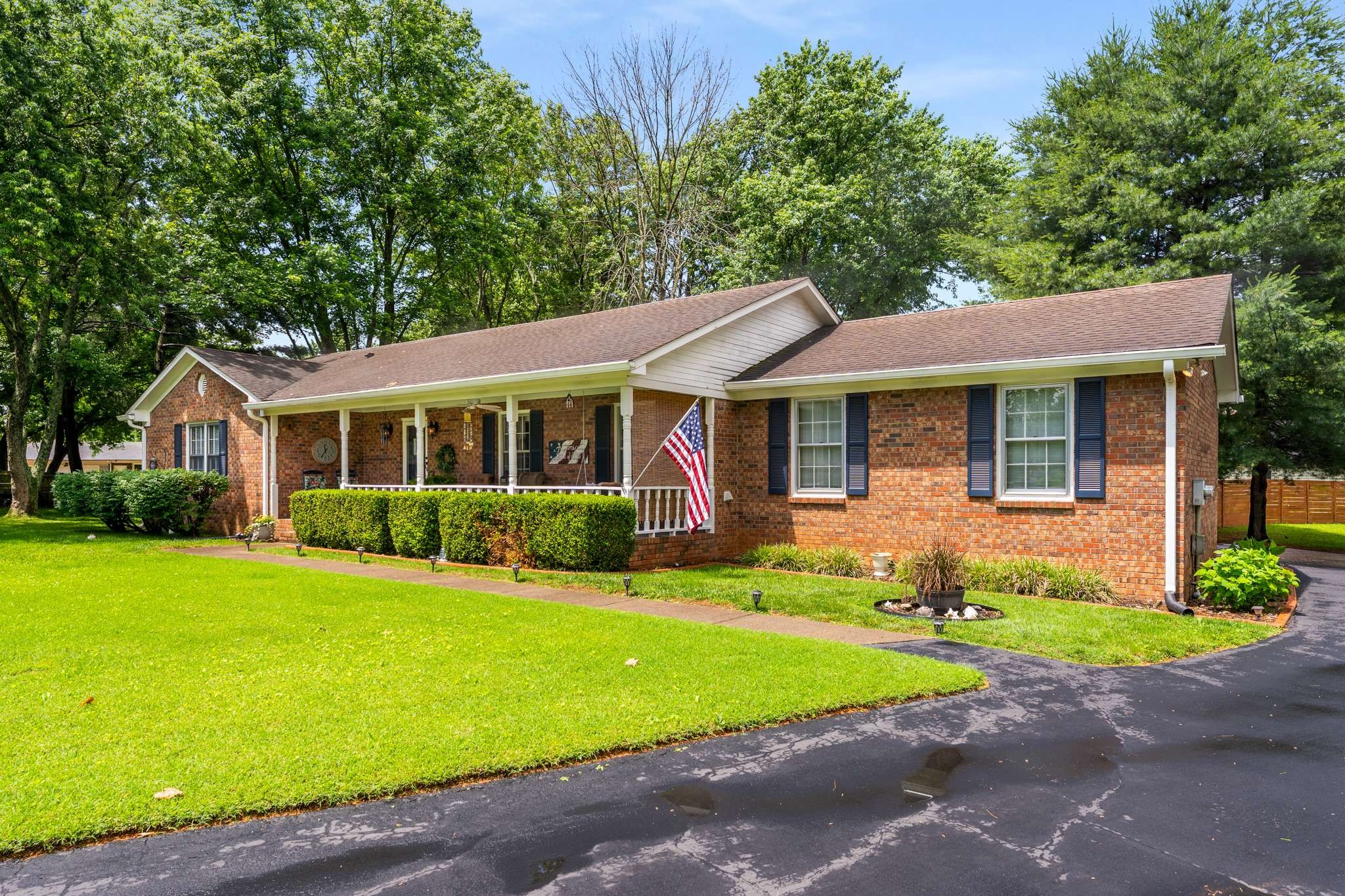 513 Rose Circle Murfreesboro, TN 37128 - Photo 2 of 37 a front view of a house with a yard and garage