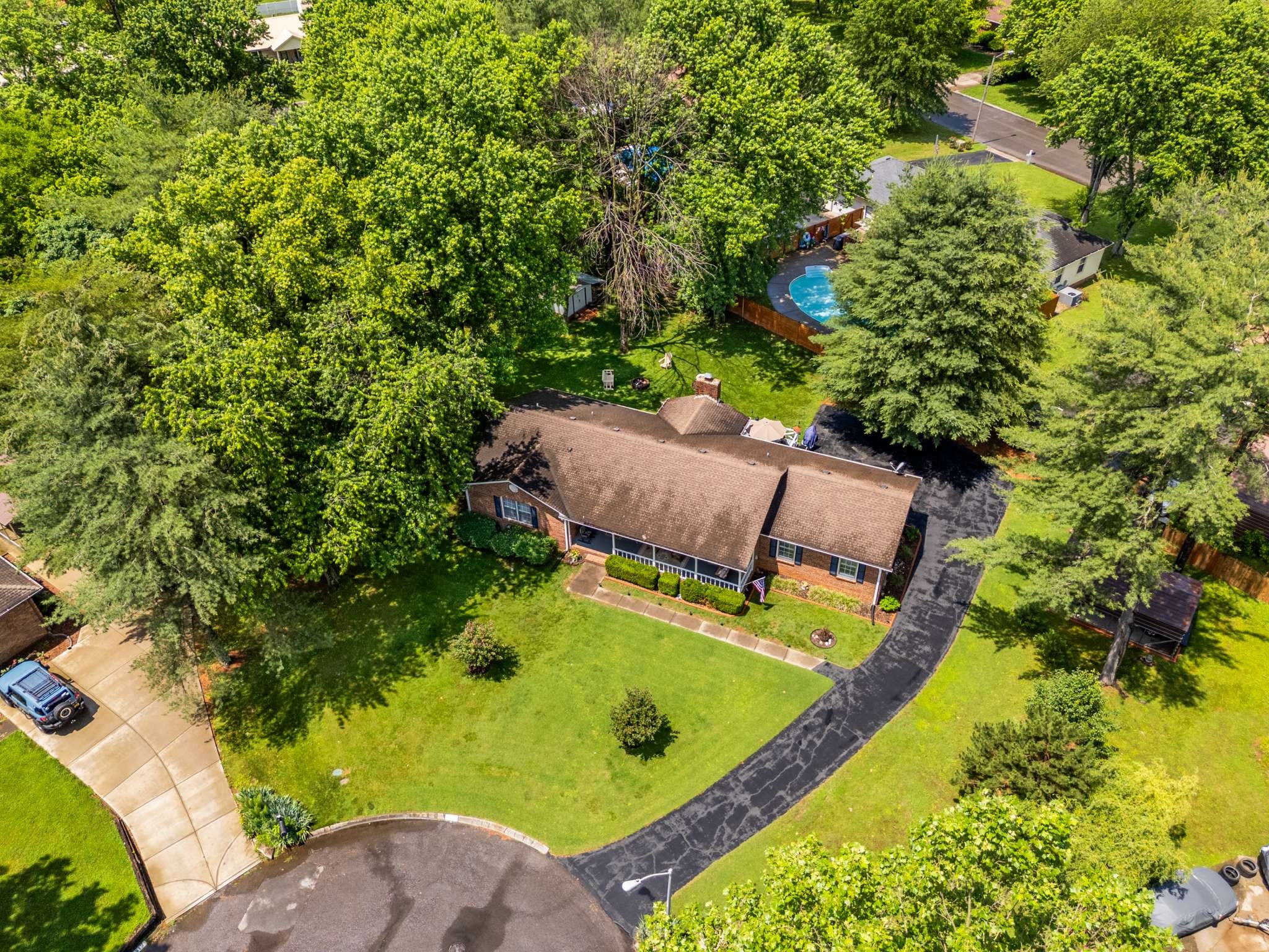 513 Rose Circle Murfreesboro, TN 37128 - Photo 35 of 37 a view of a swimming pool with a yard