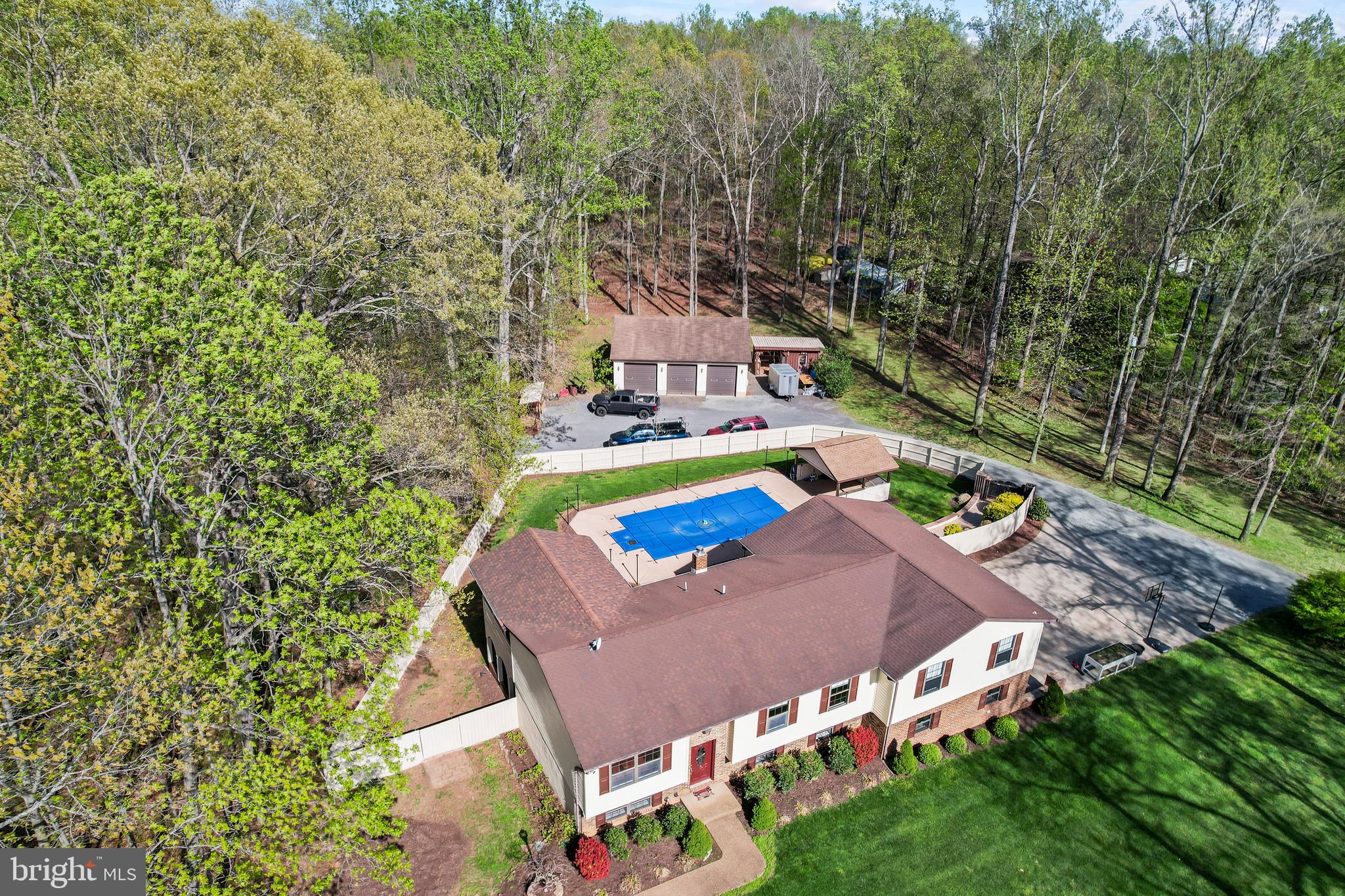 9433 Dutch Hollow Road Rixeyville, VA 22737 - Photo 54 of 63 an aerial view of a house with a yard swimming pool a patio and yard