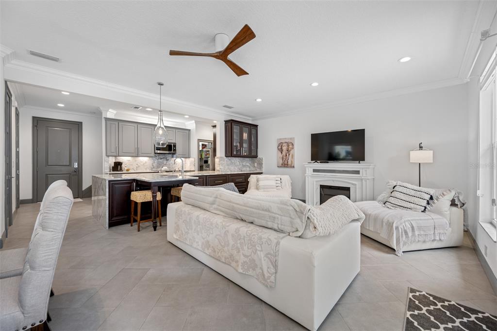 237 7th Avenue North, Unit 2 St. Petersburg, FL 33701 - Photo 14 of 60 a living room with furniture and kitchen view