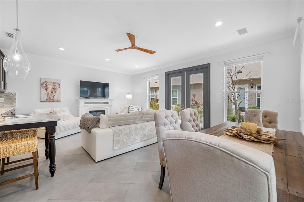237 7th Avenue North, Unit 2 St. Petersburg, FL 33701 - Photo 18 of 60 a living room with furniture and a large window