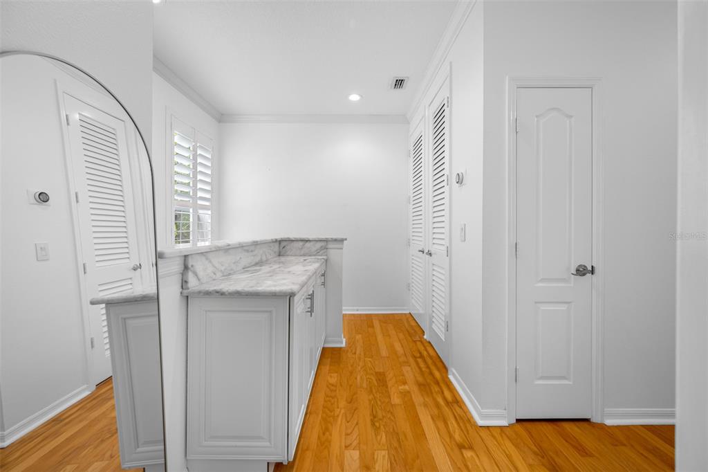 237 7th Avenue North, Unit 2 St. Petersburg, FL 33701 - Photo 27 of 60 a bathroom with a sink and a mirror
