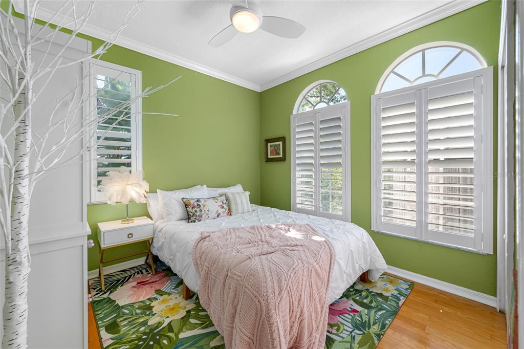 237 7th Avenue North, Unit 2 St. Petersburg, FL 33701 - Photo 39 of 60 a bedroom with a bed and a window