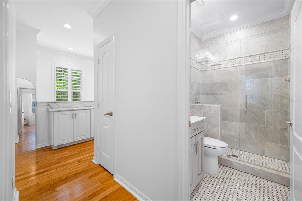 237 7th Avenue North, Unit 2 St. Petersburg, FL 33701 - Photo 43 of 60 a bathroom with a sink and a shower