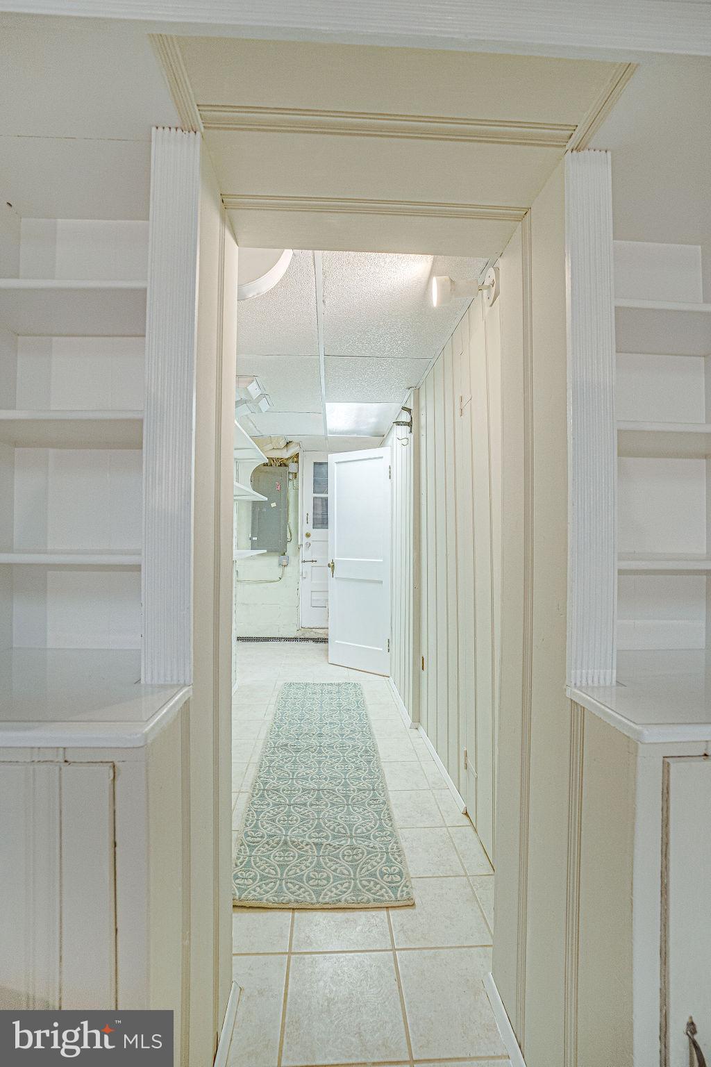 6471 Blenheim Road Baltimore, MD 21212 - Photo 22 of 50 Built-In Bookcases w/Hallway