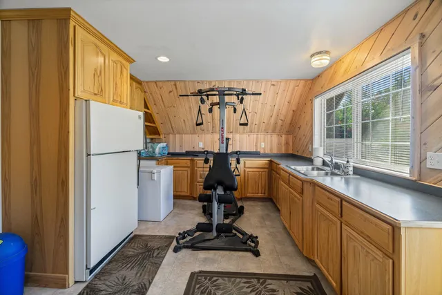 a view of a yard with a tree