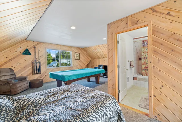 a view of a backyard with sitting area