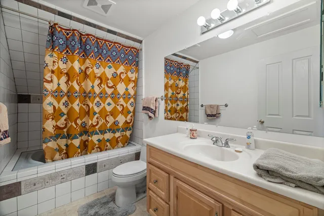 an aerial view of a house with a garden