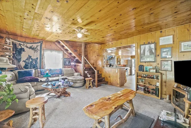 a kitchen with sink cabinets and outdoor seating