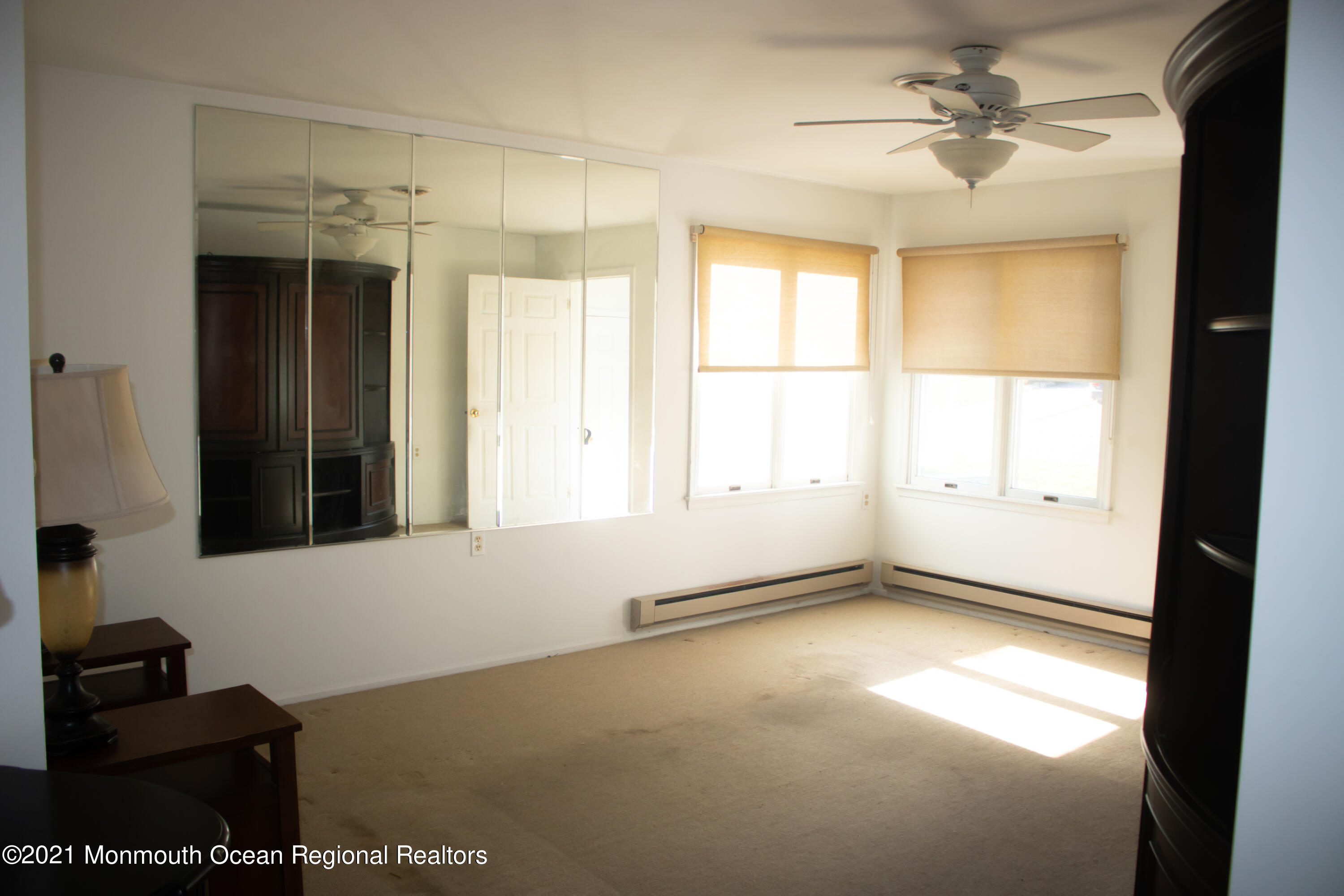 47 Sycamore Access Road Manahawkin, NJ 08050 - Photo 8 of 37 a view of an empty room with a window
