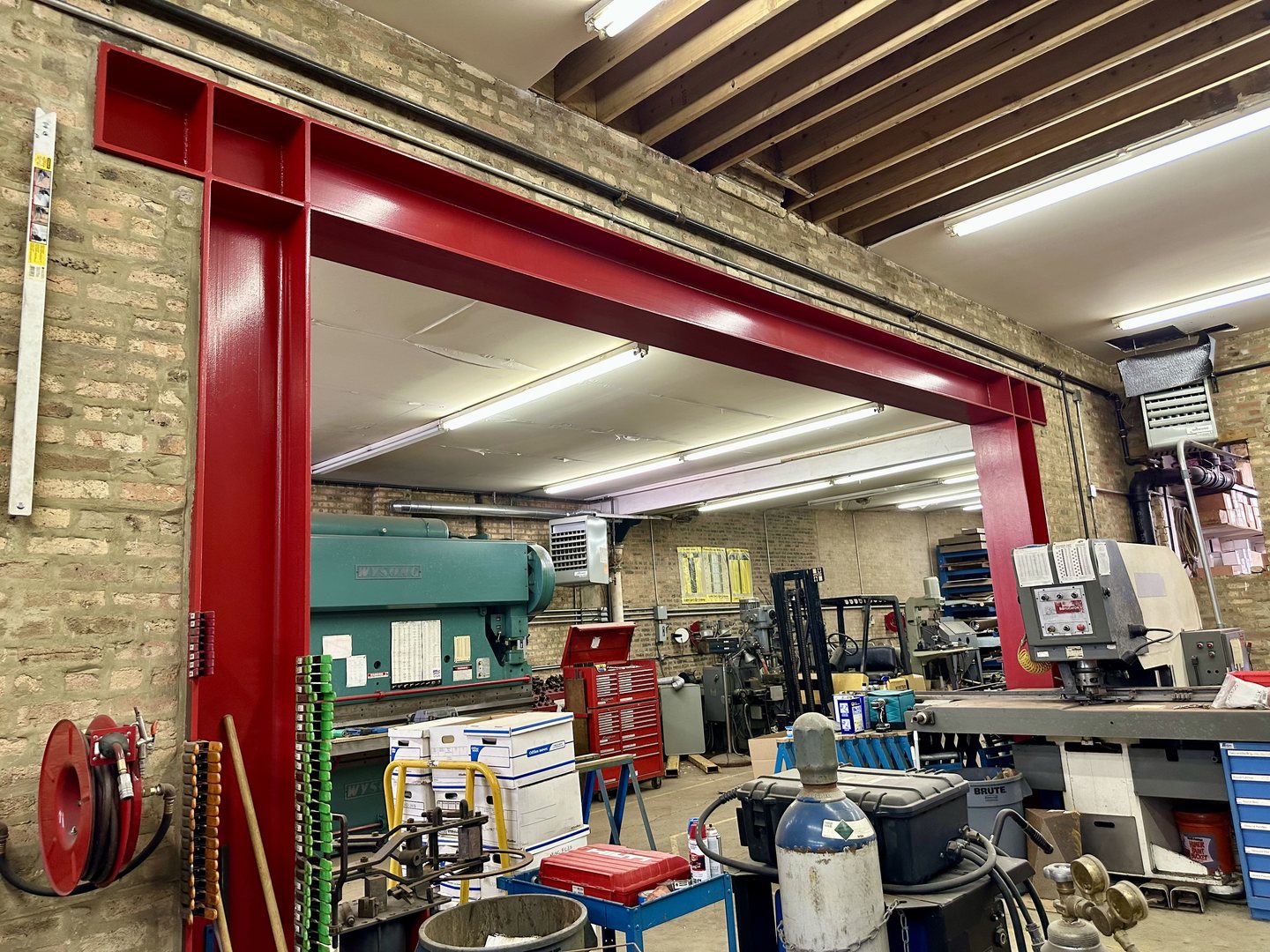 1906-1908 North Milwaukee Avenue Chicago, IL 60647 - Photo 20 of 32 a room with lots of furniture and clutter