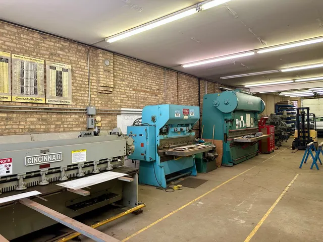 a gym with lots of furniture and clutter