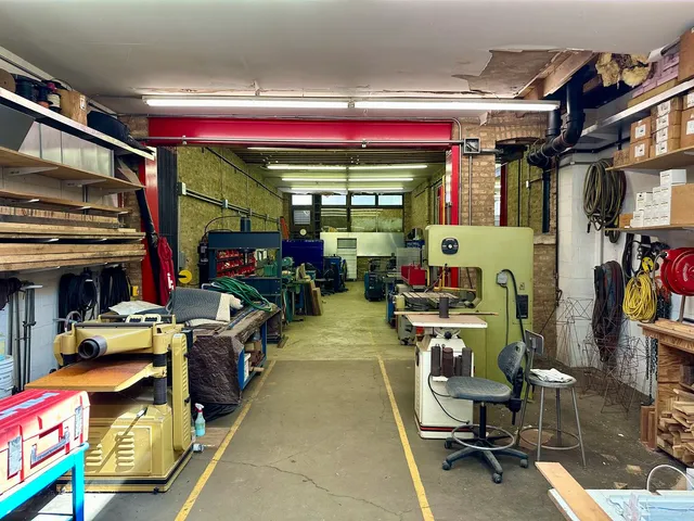 a bathroom with a shower and a sink