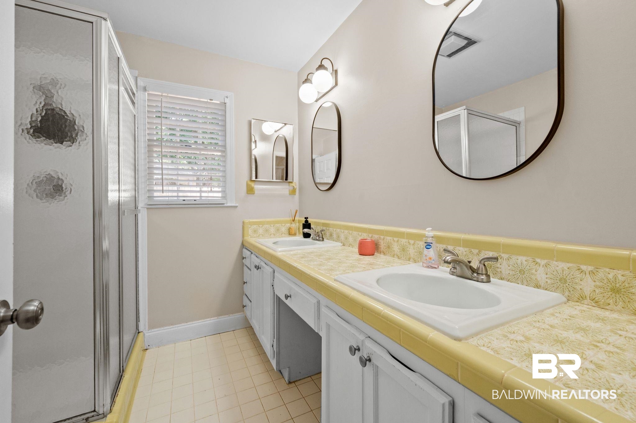110 Ferncliff Circle Daphne, AL 36526 - Photo 27 of 40 Bathroom featuring double vanity, a shower stall, baseboards, and tile patterned floors