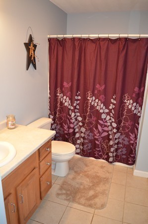 247 Collins Road Hardwick, MA 01082 - Photo 11 of 16 a bathroom with a toilet sink and shower