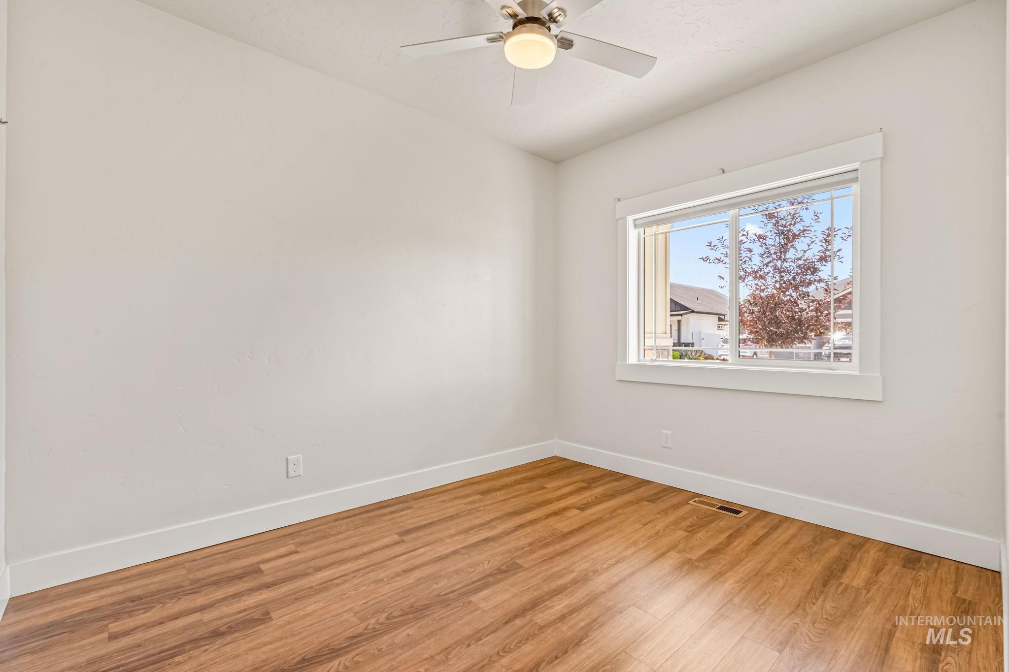395 Cutlass Payette, ID 83661 - Photo 16 of 26 Spare room with wood finished floors and ceiling fan