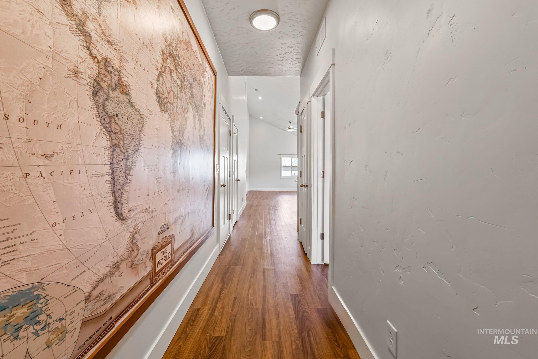 395 Cutlass Payette, ID 83661 - Photo 4 of 26 Hallway with wood finished floors and recessed lighting