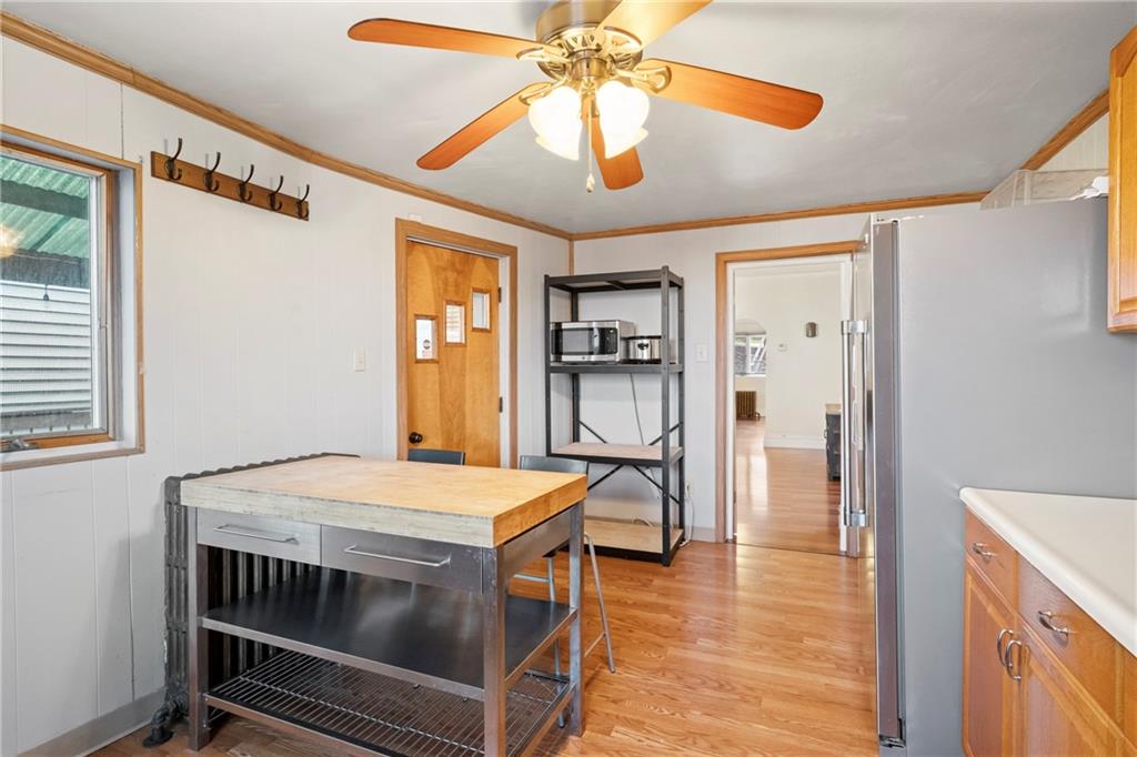2725 Sumner Street Pittsburgh, PA 15203 - Photo 13 of 37 a kitchen that has a stove and a table in it
