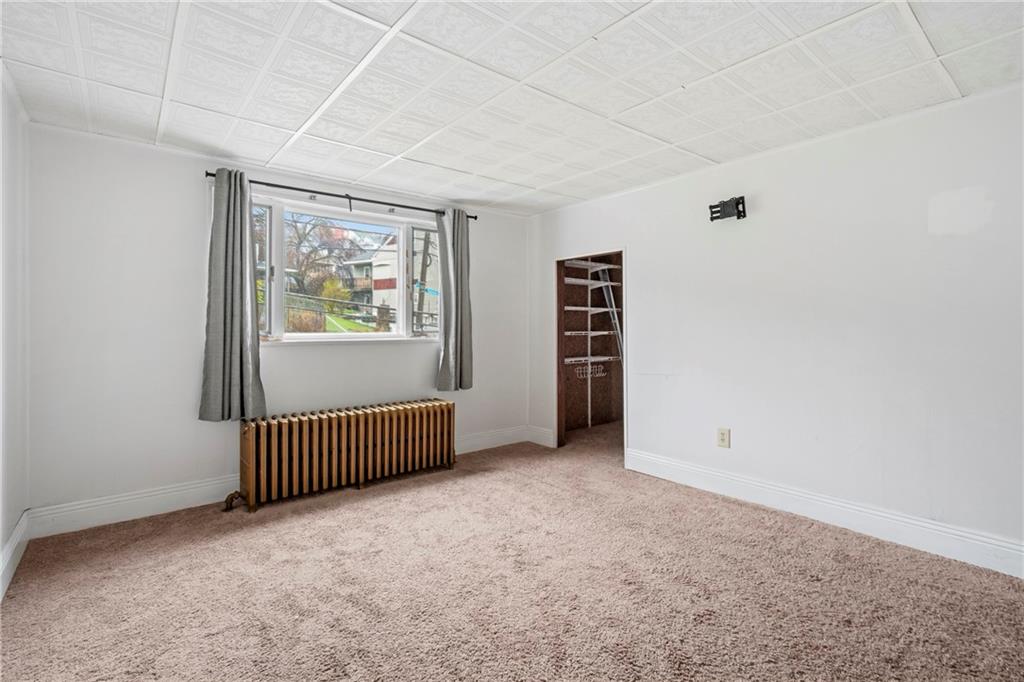 2725 Sumner Street Pittsburgh, PA 15203 - Photo 15 of 37 an empty room with windows