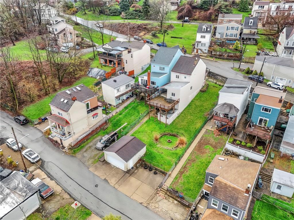 2725 Sumner Street Pittsburgh, PA 15203 - Photo 30 of 37 an aerial view of a house with a garden and lake view