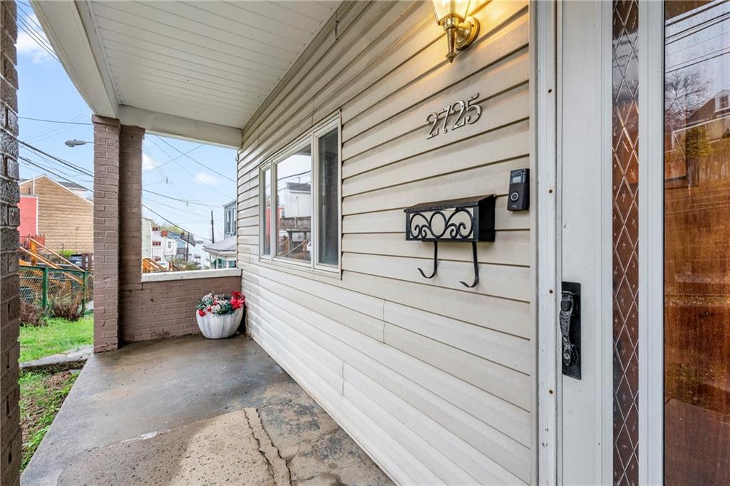 2725 Sumner Street Pittsburgh, PA 15203 - Photo 4 of 37 a view of a two door and an outdoor space