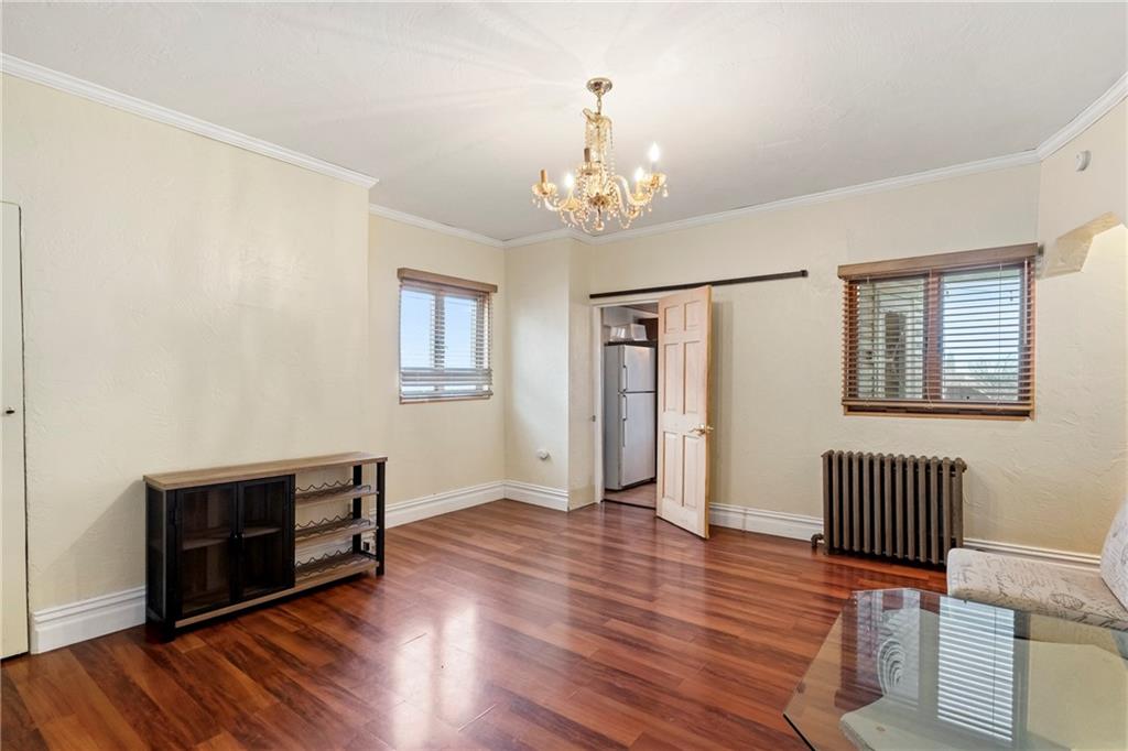 2725 Sumner Street Pittsburgh, PA 15203 - Photo 8 of 37 a view of livingroom with furniture and wooden floor