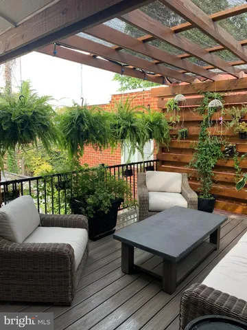 a bedroom with double bed and a window
