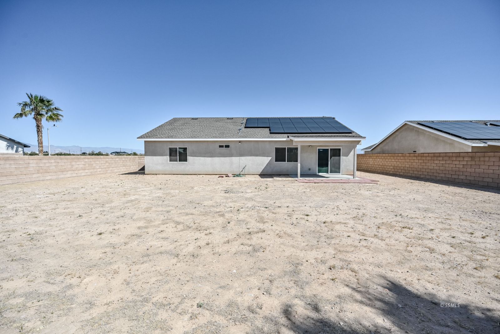 1031 West Church Avenue Ridgecrest, CA 93555 - Photo 45 of 49 a front view of a house with a yard