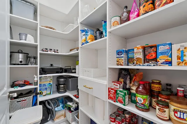 a view of a pathway with a yard