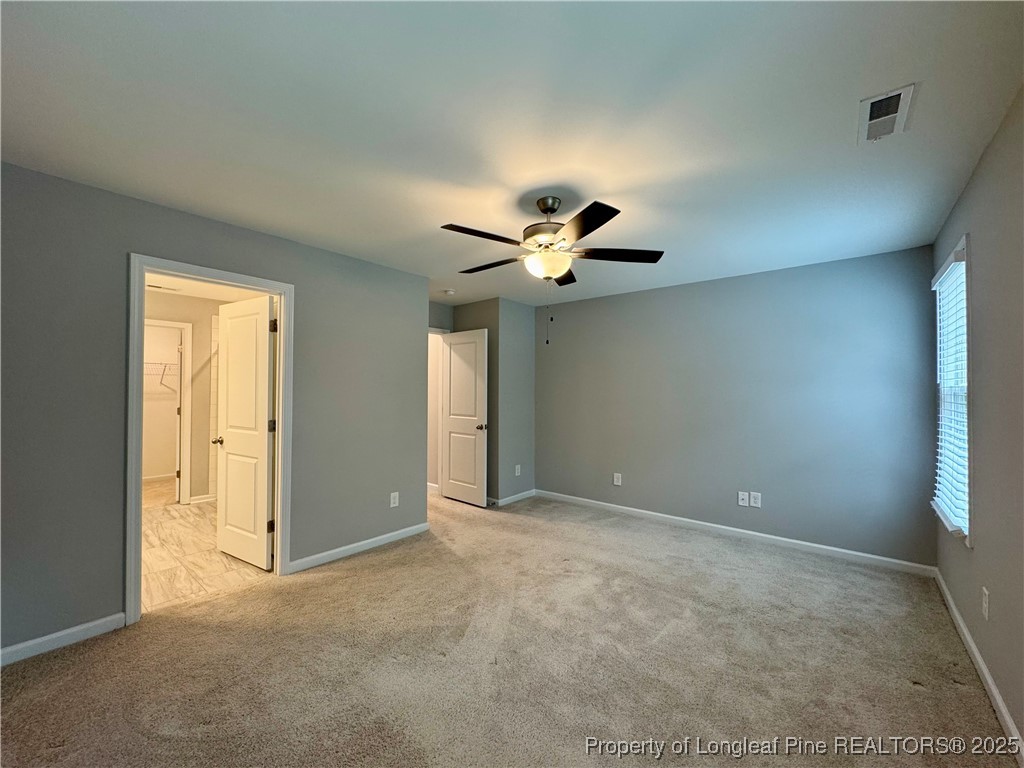808 Jackson Street Raeford, NC 28376 - Photo 10 of 21 a view of an empty room with a window