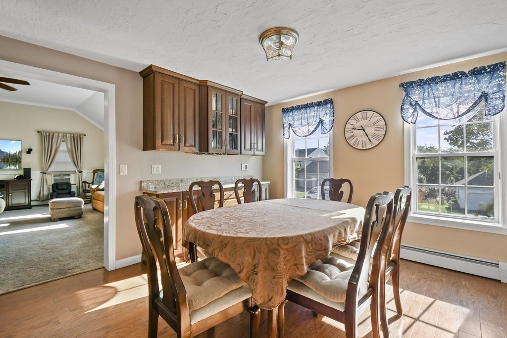 82 Buttermilk Road Leominster, MA 01453 - Photo 13 of 42 a view of a dining room with furniture and a large window
