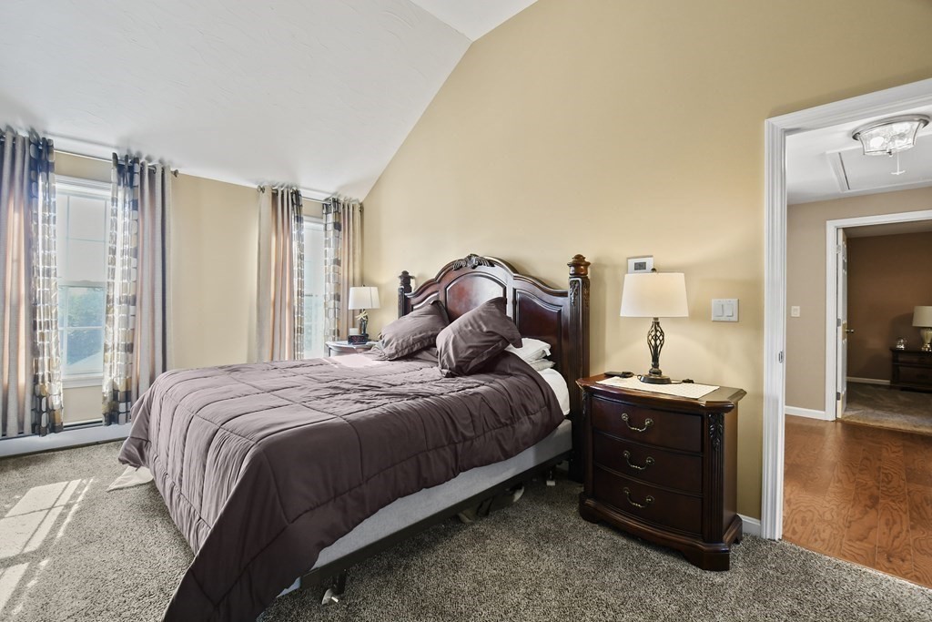 82 Buttermilk Road Leominster, MA 01453 - Photo 20 of 42 a bedroom with a bed and a night stand