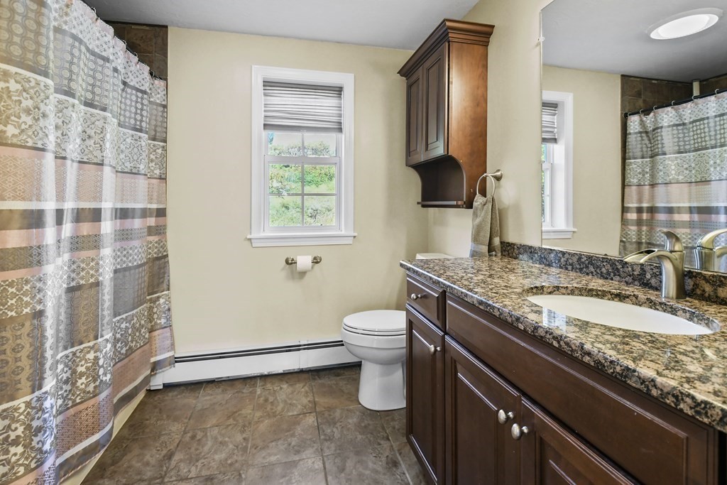 82 Buttermilk Road Leominster, MA 01453 - Photo 22 of 42 a bathroom with a granite countertop sink toilet and shower
