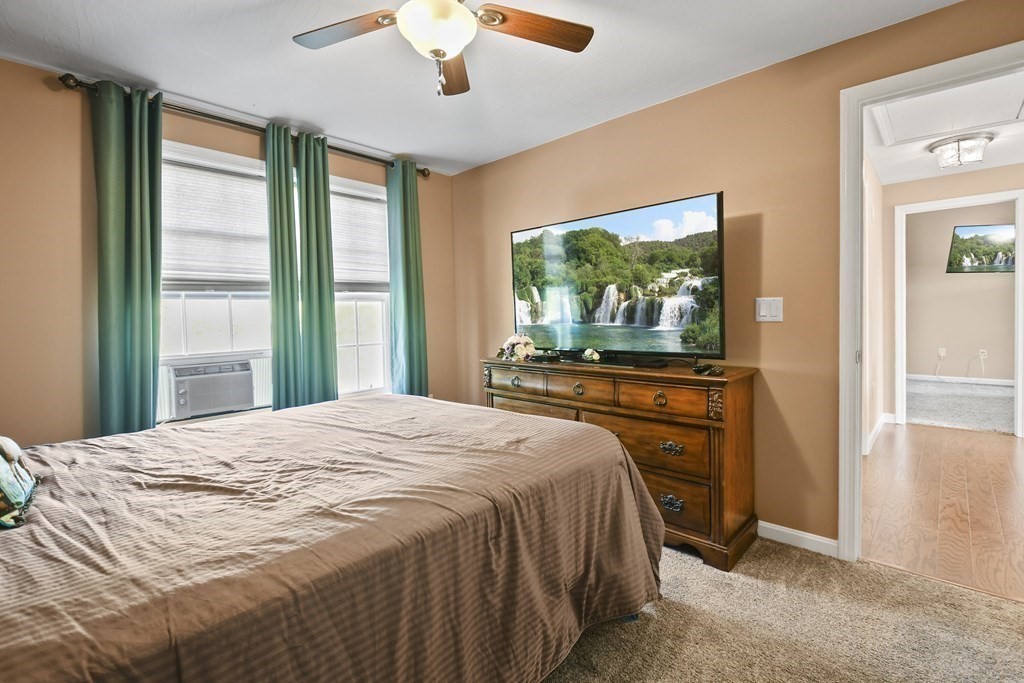 82 Buttermilk Road Leominster, MA 01453 - Photo 24 of 42 a bedroom with a bed and a large window