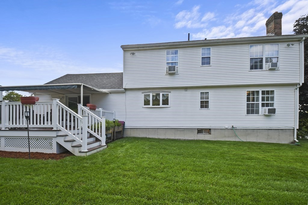 82 Buttermilk Road Leominster, MA 01453 - Photo 34 of 42 a front view of a house with a garden