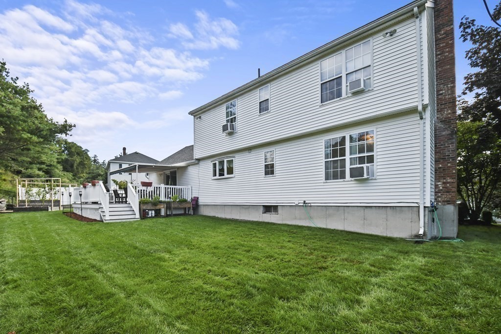 82 Buttermilk Road Leominster, MA 01453 - Photo 35 of 42 a view of a house with a yard and sitting area