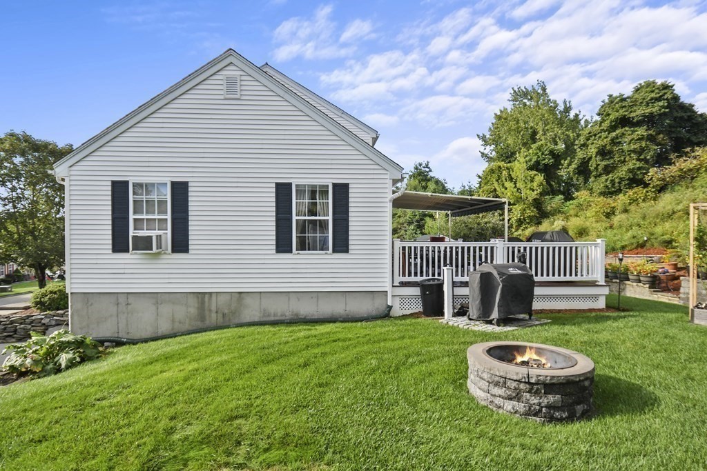 82 Buttermilk Road Leominster, MA 01453 - Photo 37 of 42 a front view of a house with a yard