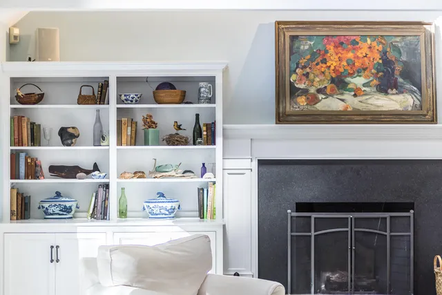 a bedroom with a large bed and a large window