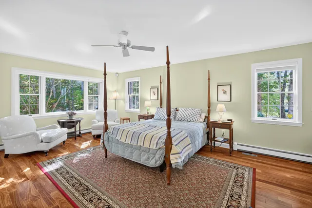 a bed room with a bed and a couch