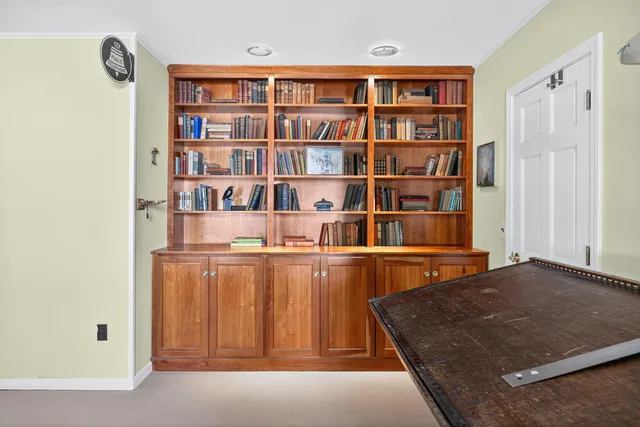 an aerial view of a house with yard and outdoor space