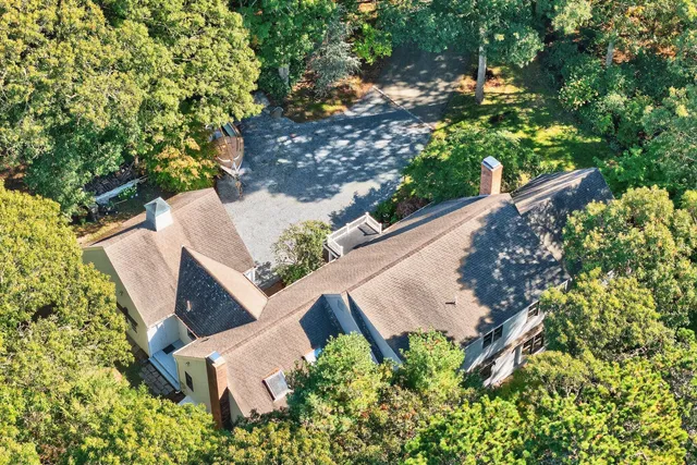 a view of entryway livingroom and hall with wooden floor