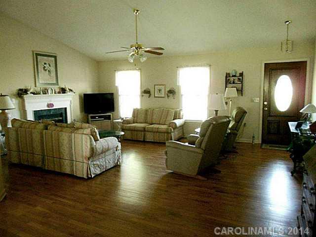 3871 River Road Hickory, NC 28602 - Photo 3 of 16 a living room with furniture and a flat screen tv