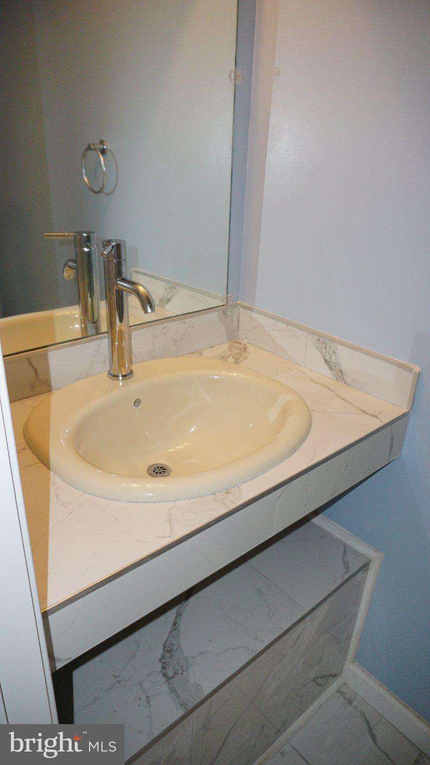 5854 Deale Churchton Road Deale, MD 20751 - Photo 53 of 57 Sleek bathroom with modern finishes.