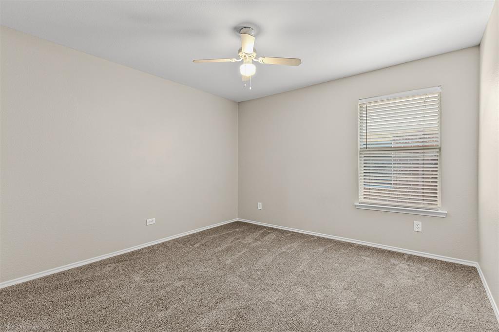 2821 Mockingbird Street Royse City, TX 75189 - Photo 11 of 21 a view of an empty room with a window