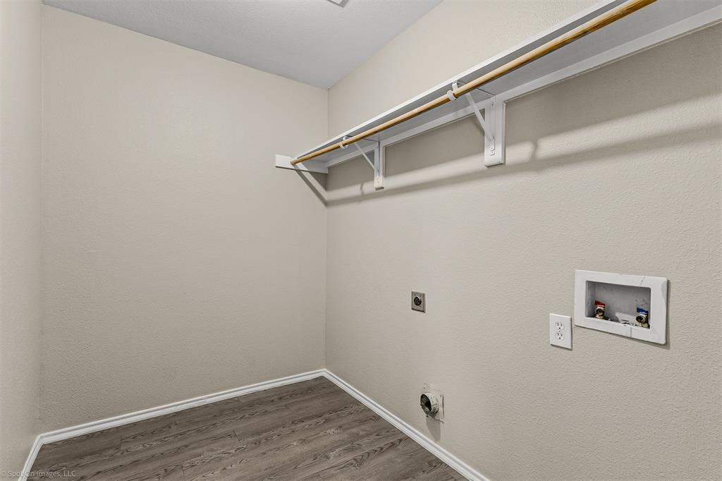 2821 Mockingbird Street Royse City, TX 75189 - Photo 14 of 21 a view of a room with wooden floor