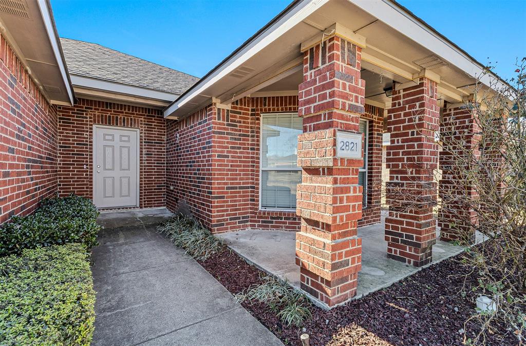 2821 Mockingbird Street Royse City, TX 75189 - Photo 4 of 21 a front view of a house with a yard