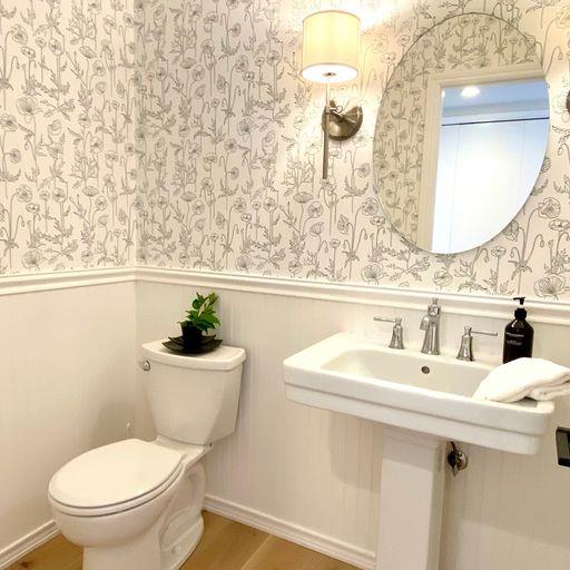 3850 Rio Road, Unit 91 Carmel, CA 93923 - Photo 14 of 31 a bathroom with a sink mirror and toilet