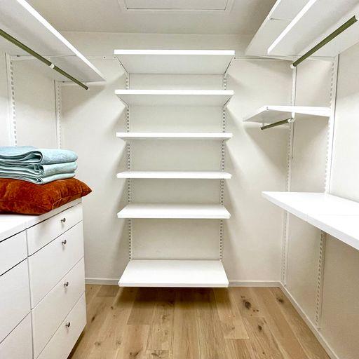 3850 Rio Road, Unit 91 Carmel, CA 93923 - Photo 21 of 31 a view of a room with shelves on the wall