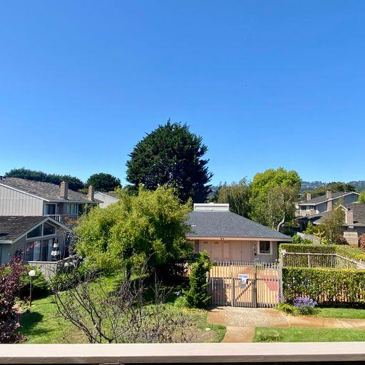 3850 Rio Road, Unit 91 Carmel, CA 93923 - Photo 27 of 31 front view of a house with a street